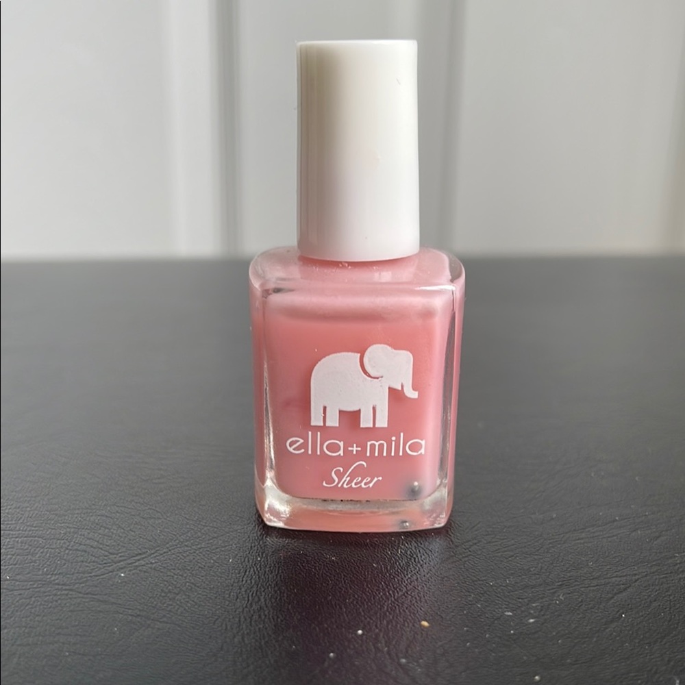 ella + Mika polish with a peachy pink tint